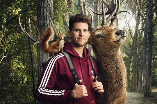Dominic Thiem in the forest  with a deer and a squirrel