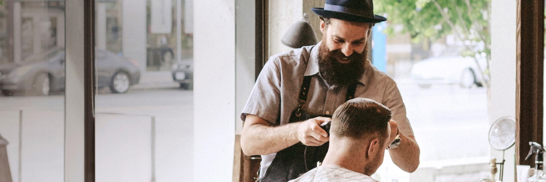 A hair cutter in his shop