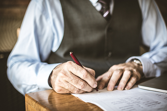 Old man wit a pencil